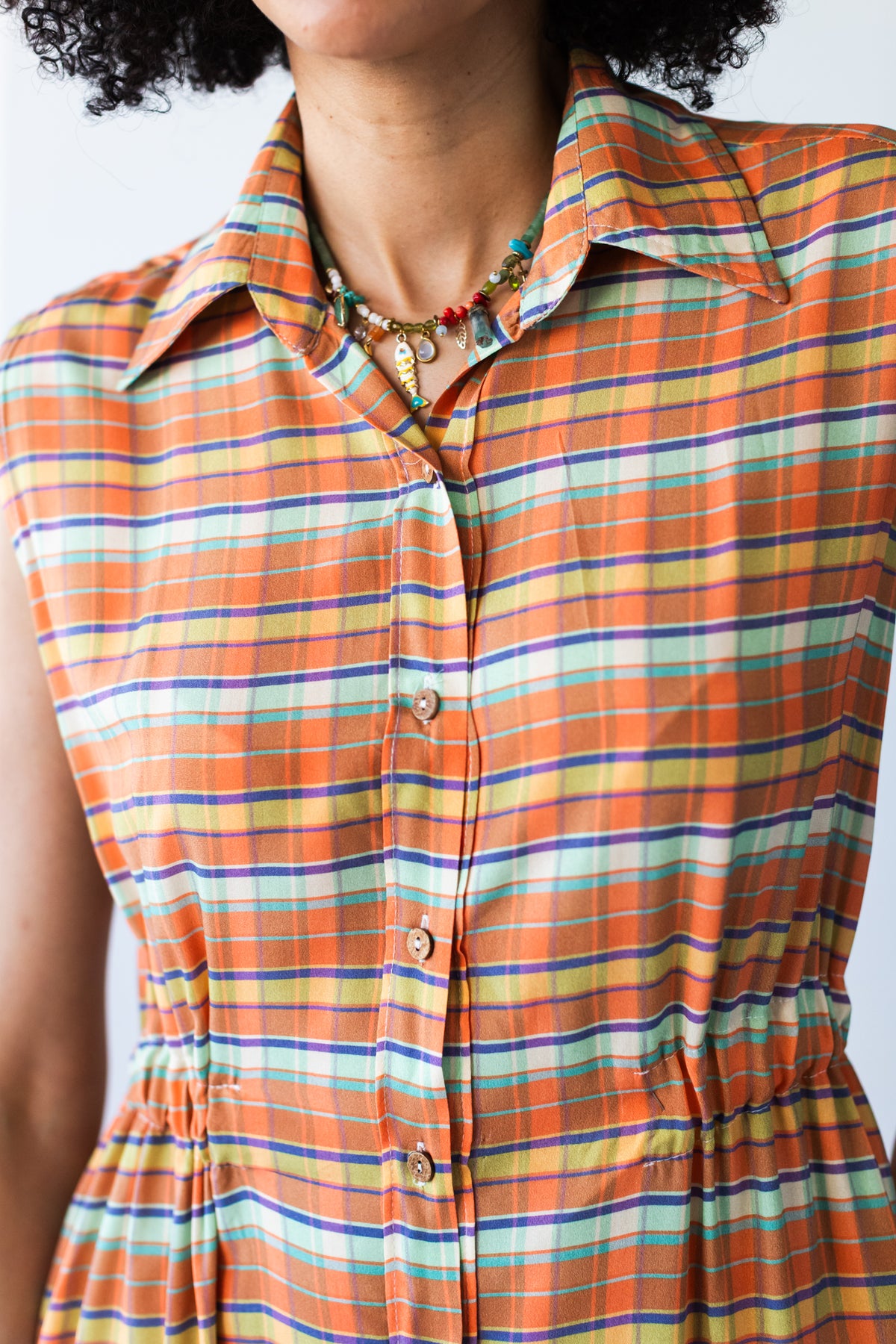 Sutton orange check shirt-dress, close-up of collar, button placket and elasticated waist