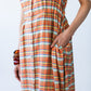 Sutton orange check shirt-dress, close-up of elasticated waist and side pocket