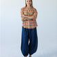 Darcy frill shirt, full-length front view with hands on hips, styled with Stella balloon pants