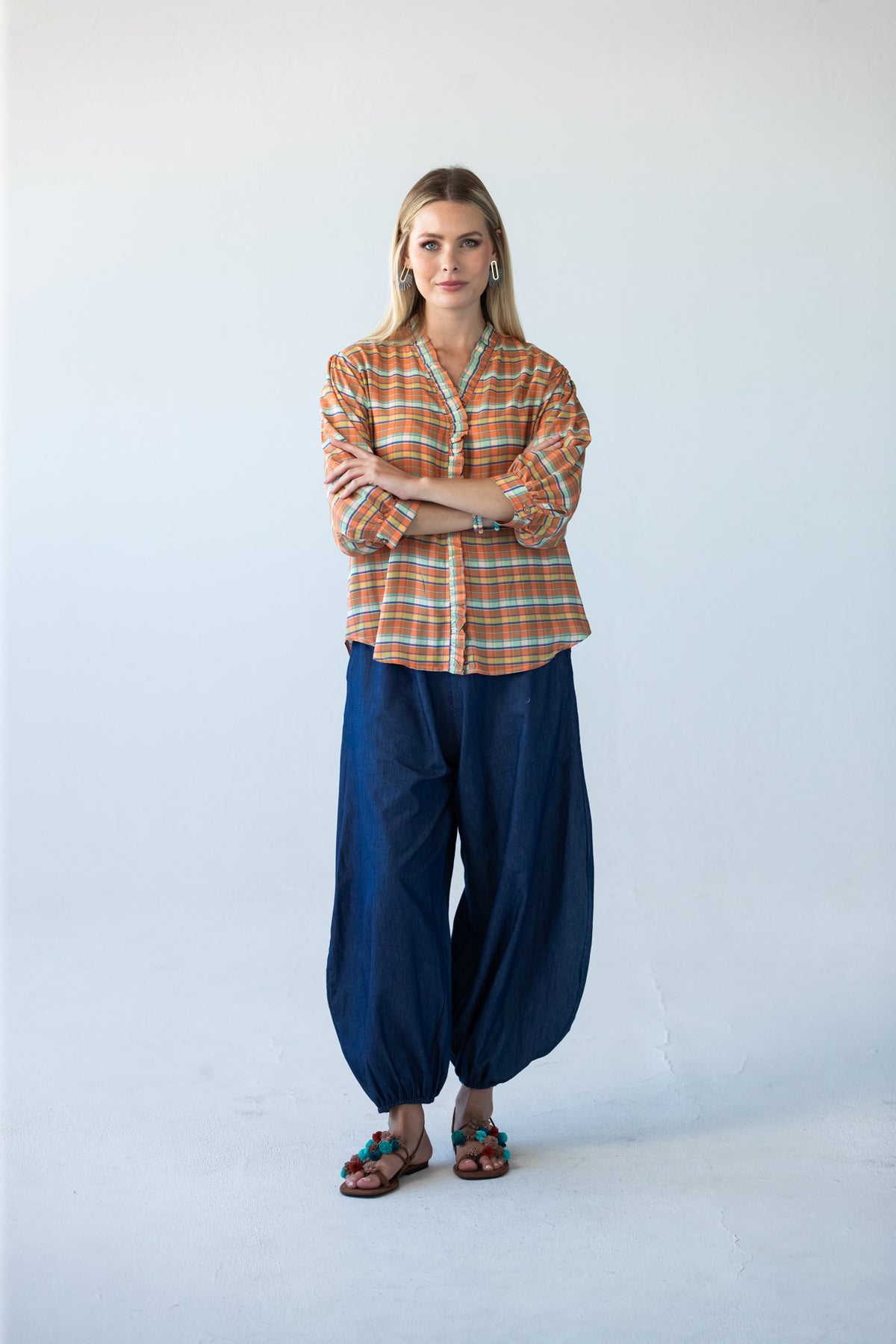 Darcy frill shirt, full-length front view with hands on hips, styled with Stella balloon pants