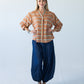 Darcy frill shirt, full-length front view with arms crossed, styled with Stella balloon pants