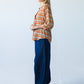 Darcy frill shirt, full-length side view showing curved hem
