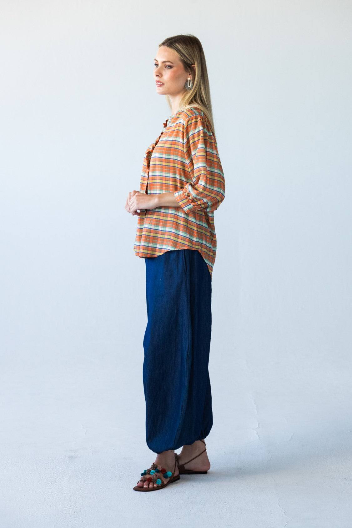 Darcy frill shirt, full-length side view showing curved hem