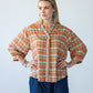 Darcy frill shirt, front view with hands on hips showing three-quarter sleeves
