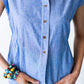 Reese stripe shirt, close up of button placket with hands at waist