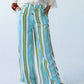 Sydney stripe wide leg pants, close up front view with hands in pockets