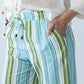 Sydney stripe wide leg pants, close up of waistband with hand in pocket