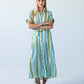 Quinn blue green stripe dress, front view with arms crossed