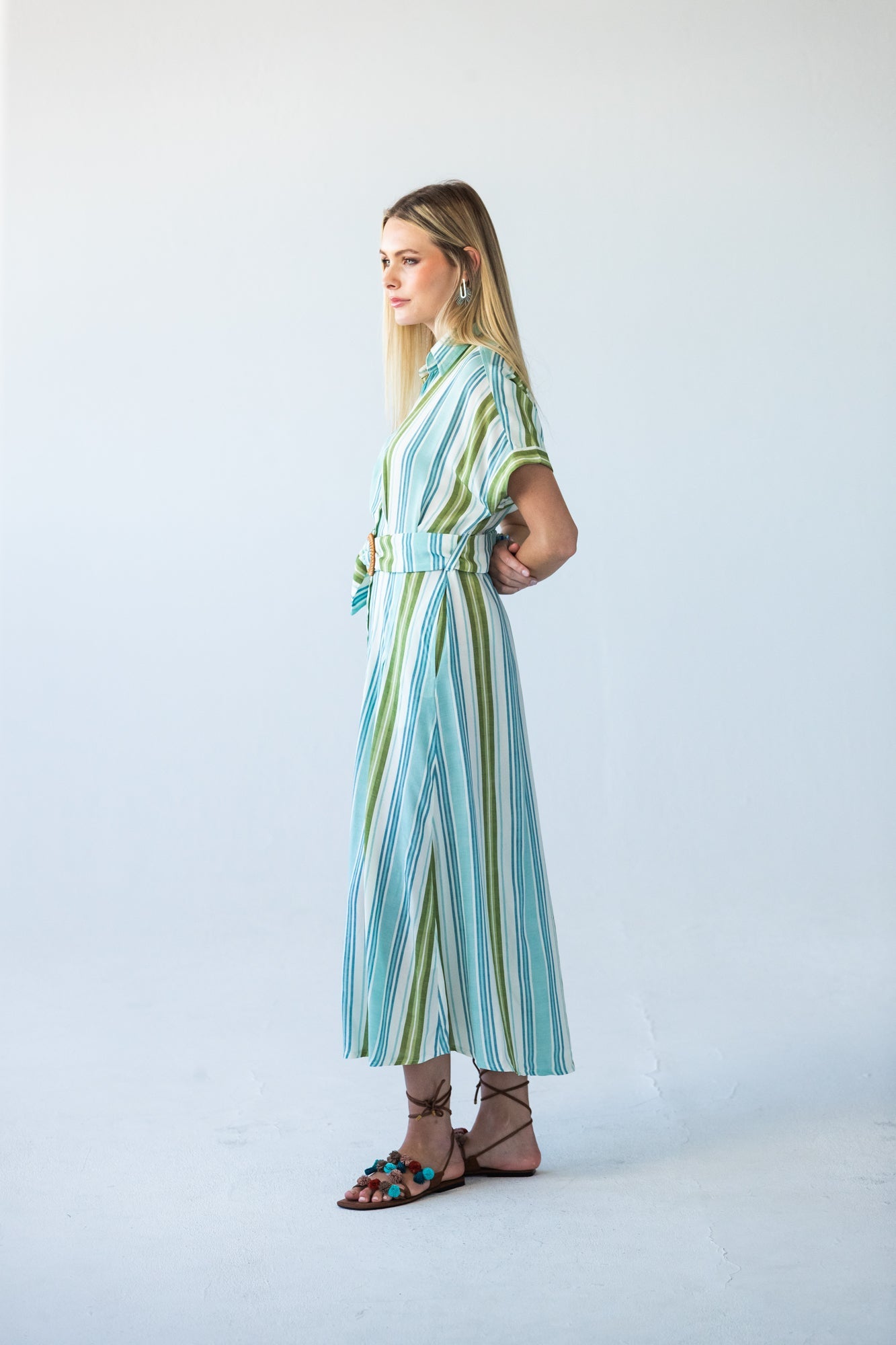 Quinn blue green stripe dress, side profile view