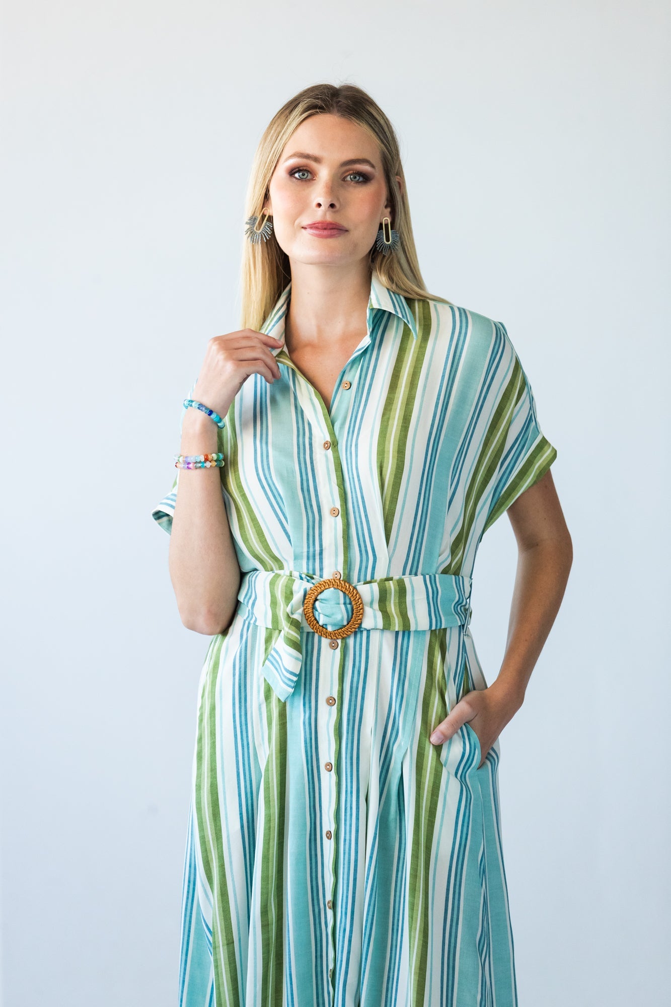 Quinn blue green stripe dress, close up of collar and belt buckle