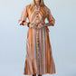 Cassidy Sunset Stripe belted shirt dress, front view, hands clasped at waist