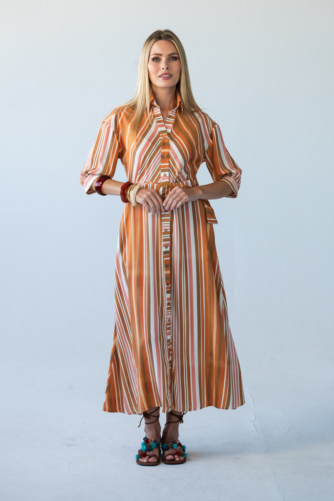 Cassidy Sunset Stripe belted shirt dress, front view, hands clasped at waist