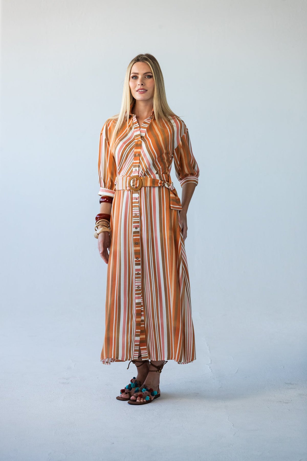Cassidy Sunset Stripe dress, front view, hands relaxed at sides