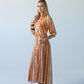 Cassidy Sunset Stripe dress, three-quarter view showing belt buckle and hip pocket