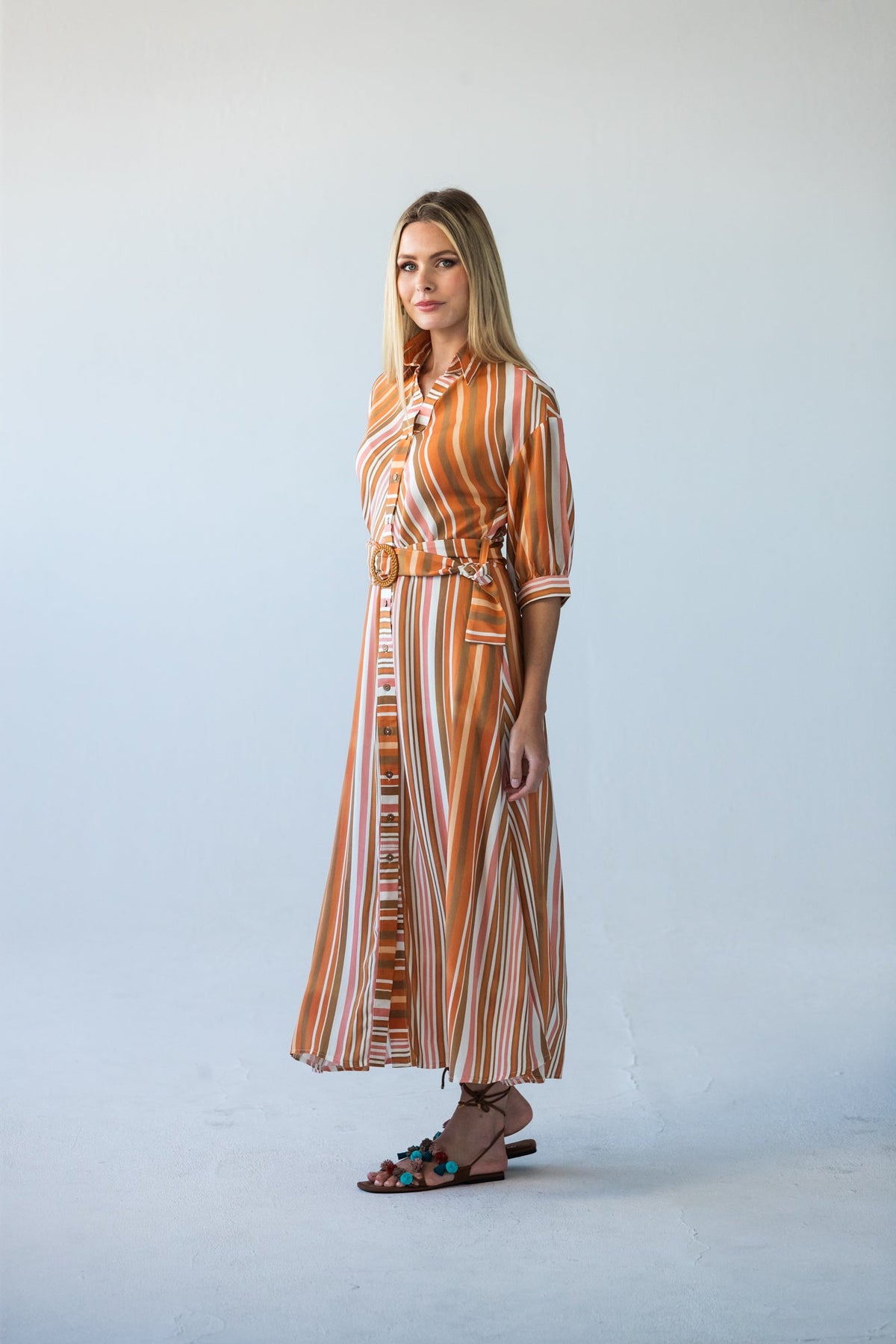 Cassidy Sunset Stripe dress, side profile, walking pose