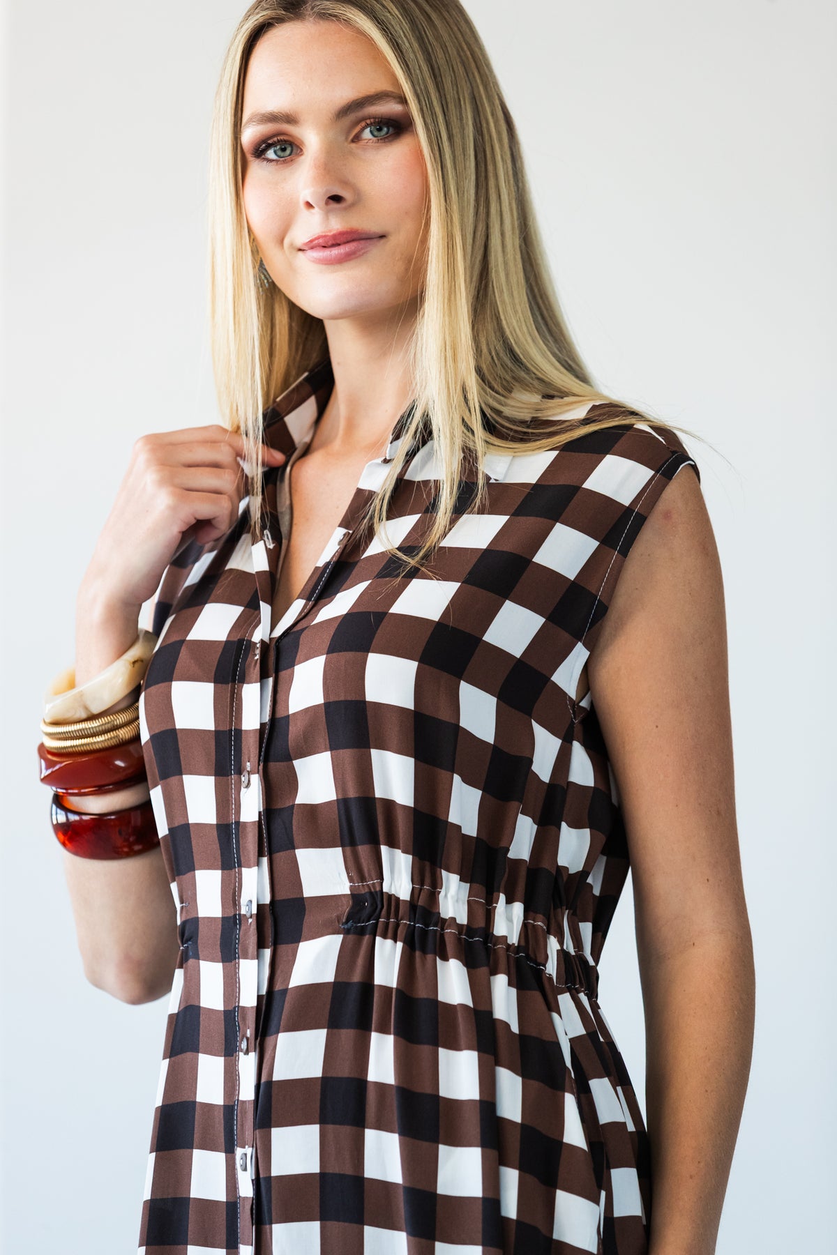Sutton chocolate check shirt-dress, three-quarter view showing collar, button placket and elasticated waist