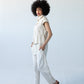 Parker stone barrel pants, side view walking, styled with matching shirt