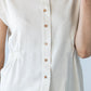 Reese stone shirt, close up of button placket and elasticated waist