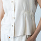 Reese stone shirt, close up of button placket and elasticated waist detail