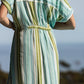 Quinn blue green stripe dress, close up of elasticated back panel, outdoor shot