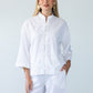 Kinsley white kaftan-style shirt, front view styled with Parker pants
