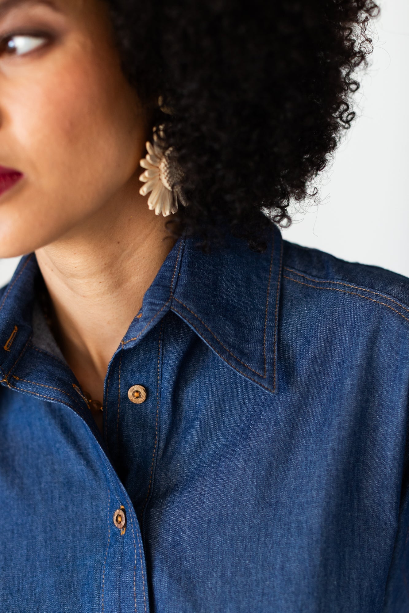 Reese denim shirt, close up of collar with earring detail