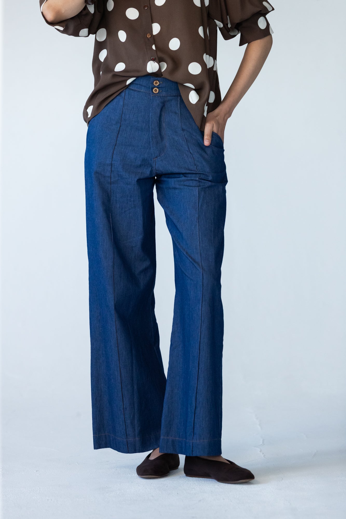 Blair wide leg denim pants, side view close up with hand in pocket