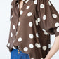 Harper polka dot shirt, three-quarter view showing shoulder seam and balloon sleeve