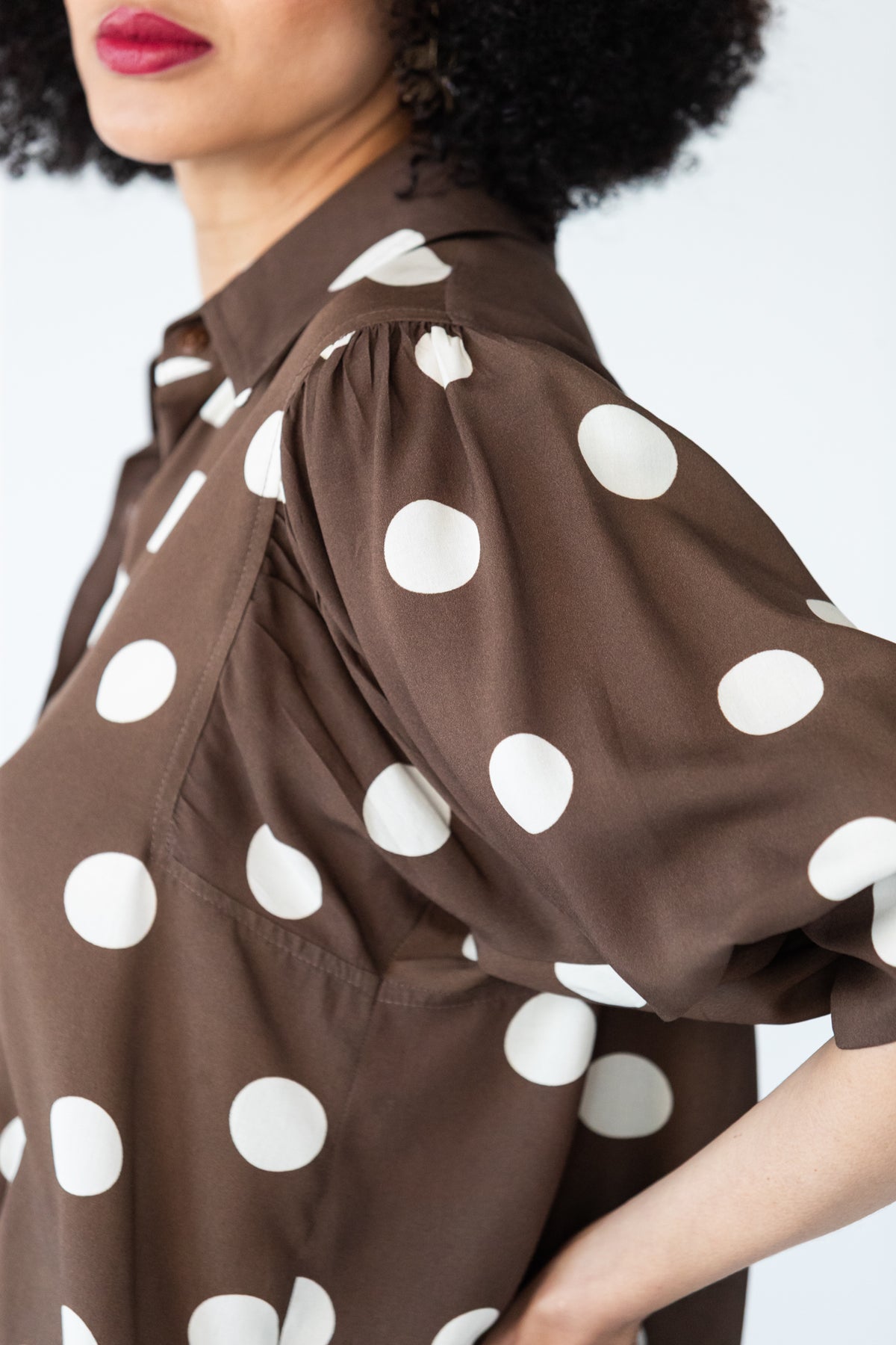 Harper polka dot shirt, side close-up of gathered sleeve head