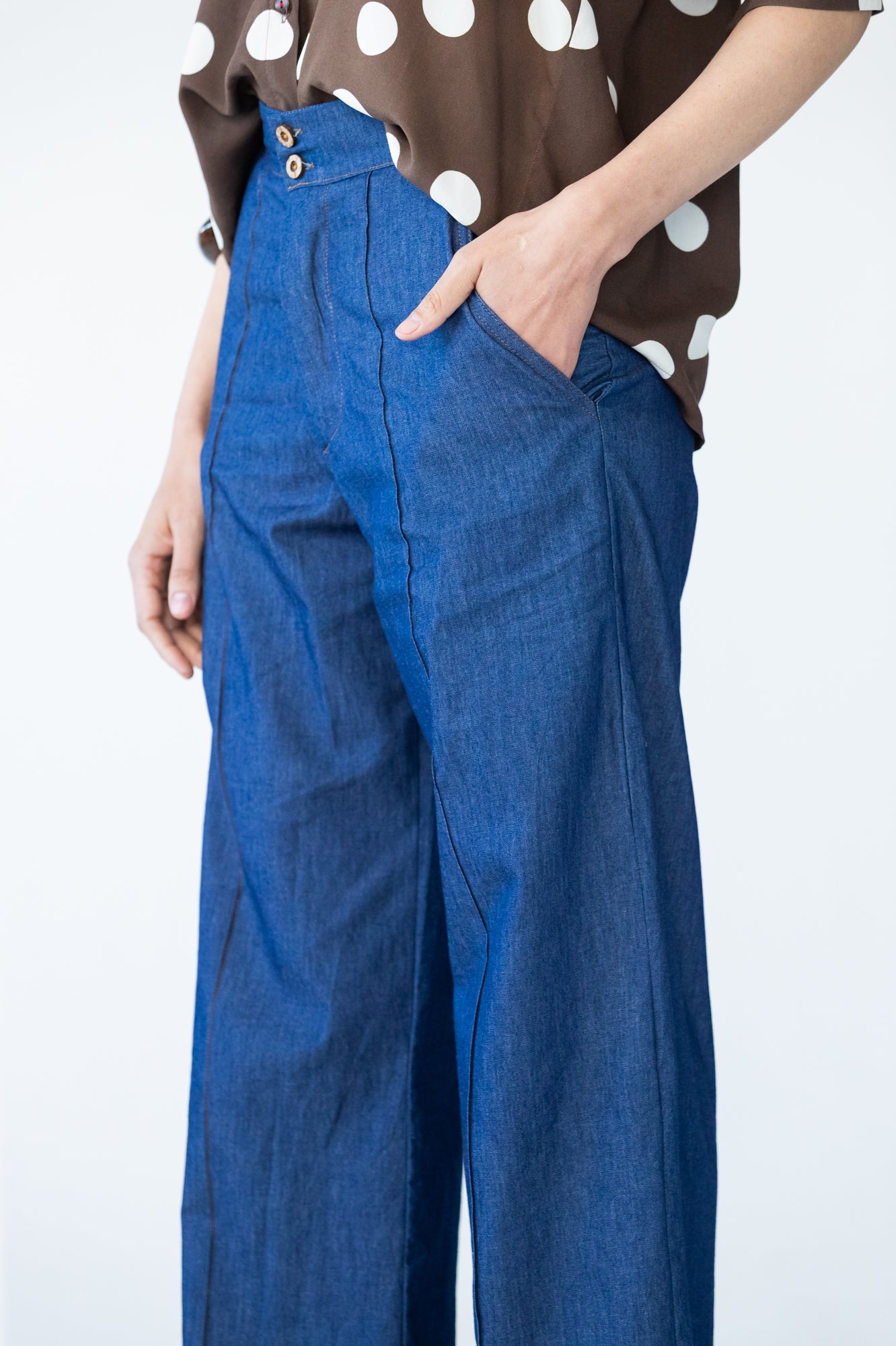 Blair wide leg denim pants, side view close up showing centre seam
