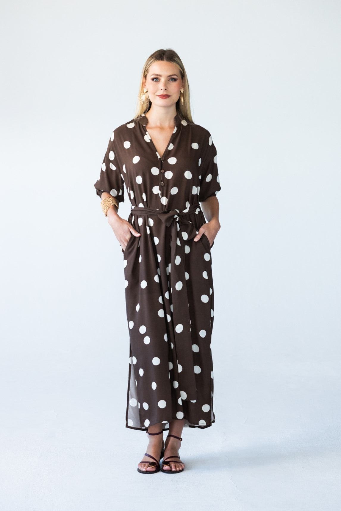 Sloane chocolate and cream polka dot dress, front view with belt
