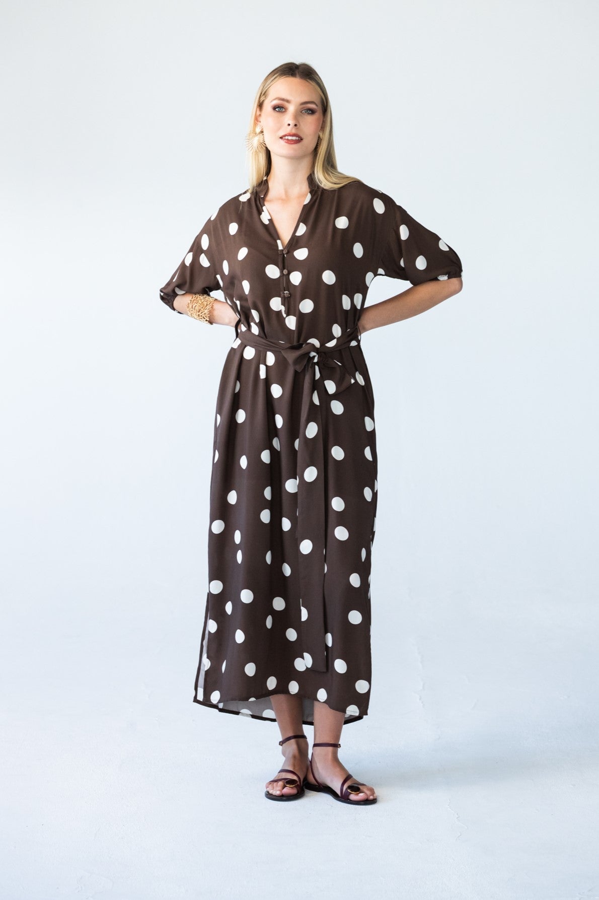 Sloane polka dot dress, front view with hands on hips