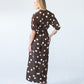 Sloane polka dot dress, side back view showing belt tie