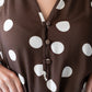 Sloane polka dot dress, close up of button and loop closure