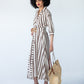 Cassidy stripe dress, side profile showing collar and gauged cuff