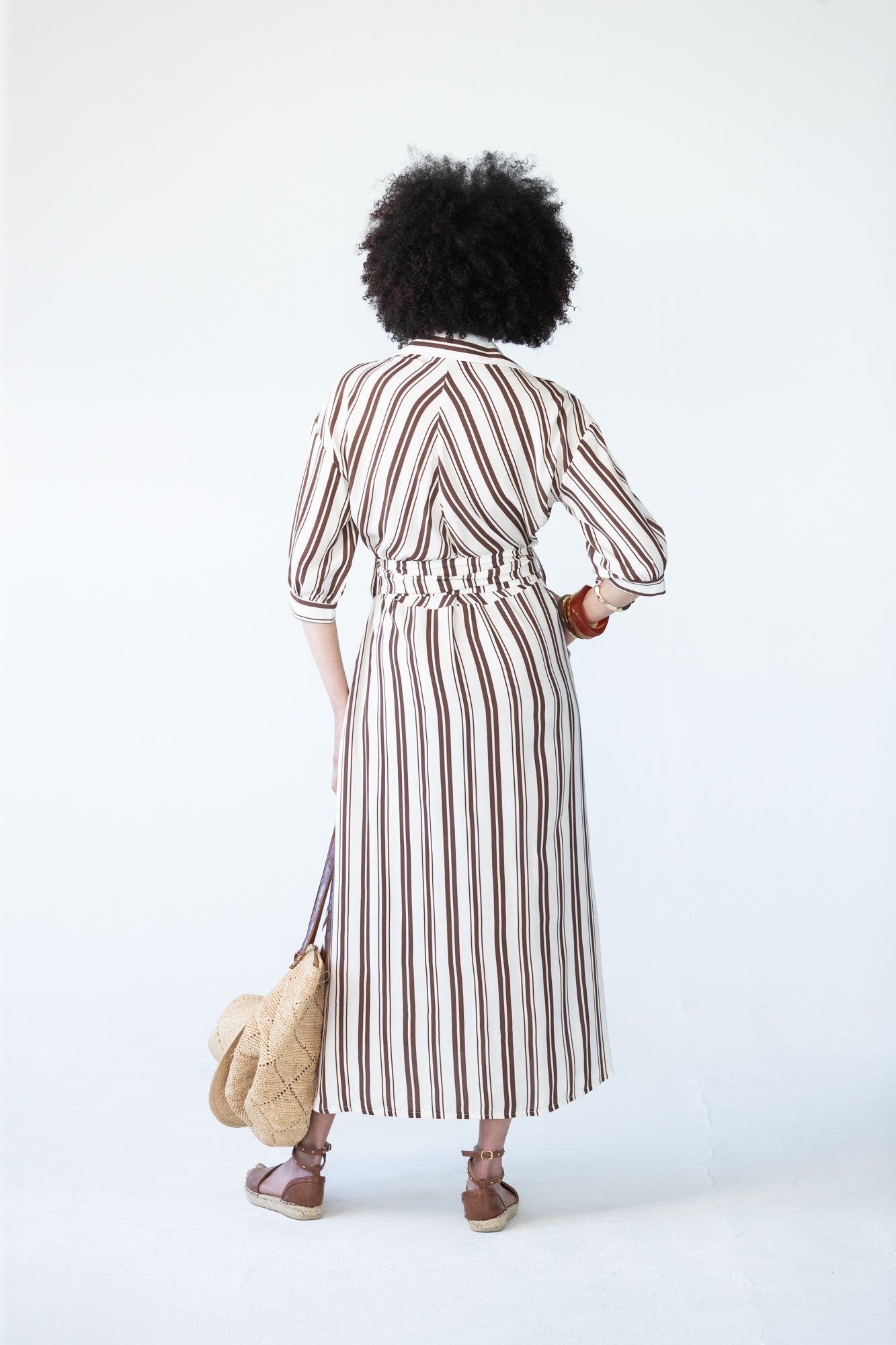 Cassidy stripe dress, back view showing bias cut bodice and vertical skirt stripe