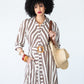 Cassidy stripe dress, close up of button stand and belt buckle