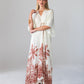 Georgia cream palm print kaftan, front view with arms crossed