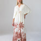 Georgia cream palm print kaftan, front view with hand on hip