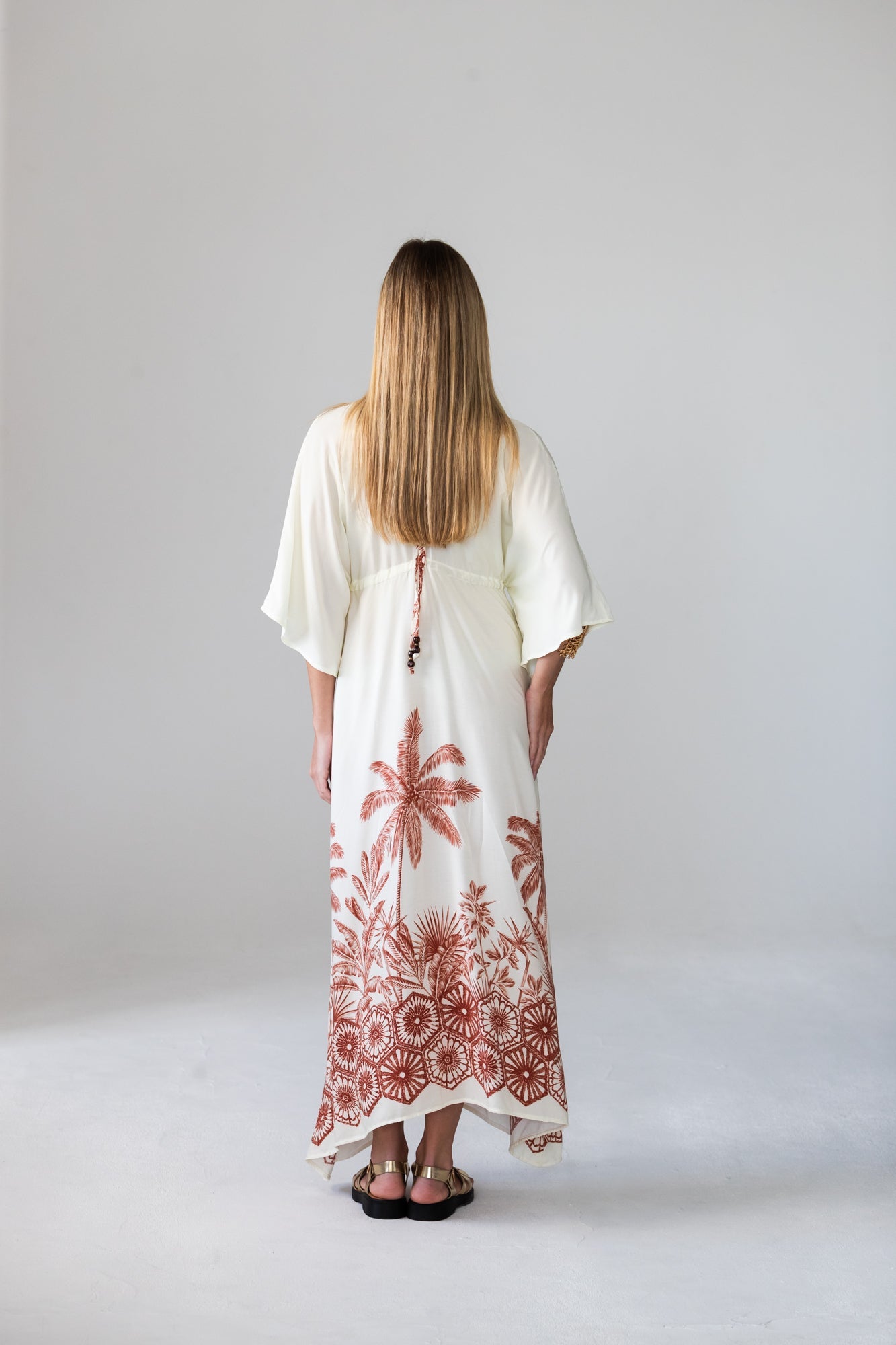 Georgia cream palm print kaftan, back view showing keyhole tie
