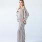 Blake chocolate stripe shirt, side profile view full length