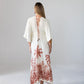Georgia cream palm print kaftan, back view with model looking away