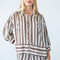 Blake chocolate stripe shirt, front view with hand at collar