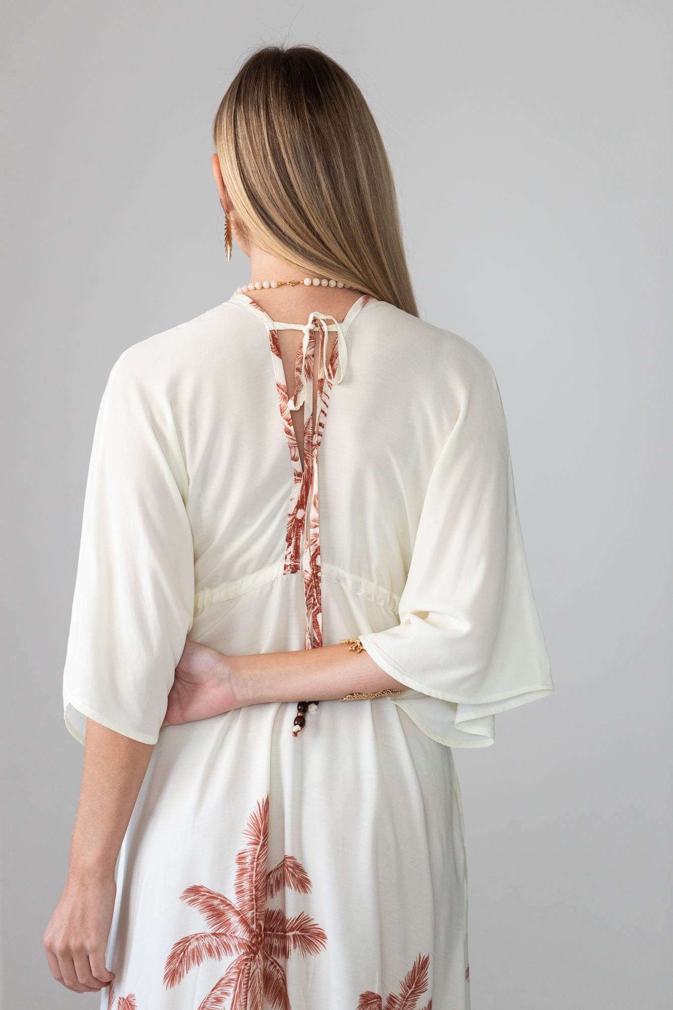 Georgia cream palm print kaftan, close up of back keyhole tie detail