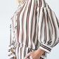 Blake chocolate stripe shirt, side view with hand in pocket