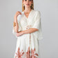 Georgia cream palm print kaftan, close up of neckline and drawstring
