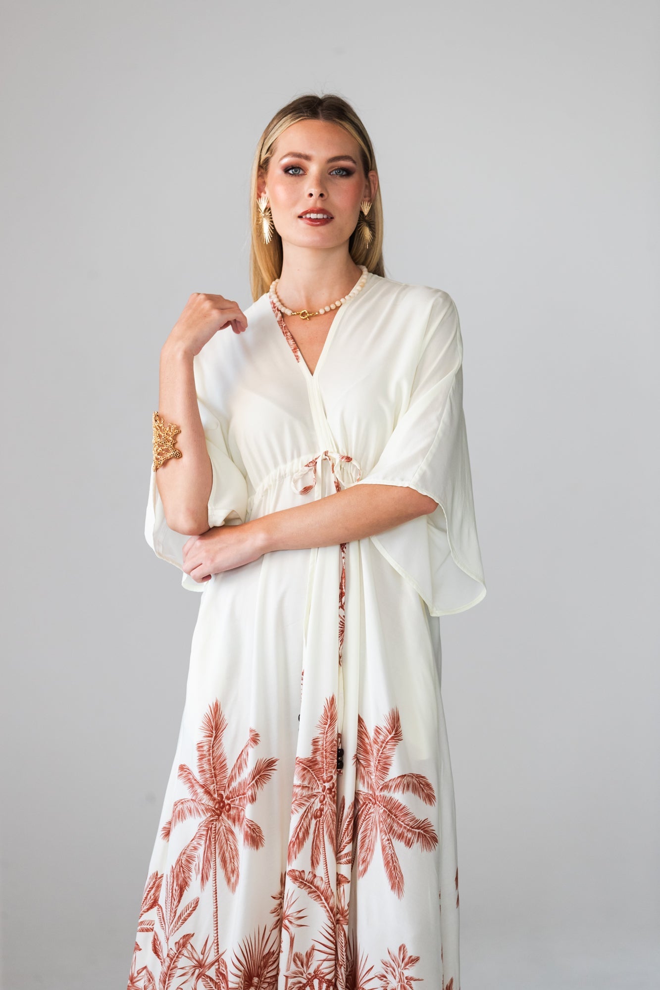Georgia cream palm print kaftan, close up of neckline and drawstring