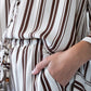 Sydney chocolate stripe wide leg pants, close up of pocket and waistband detail