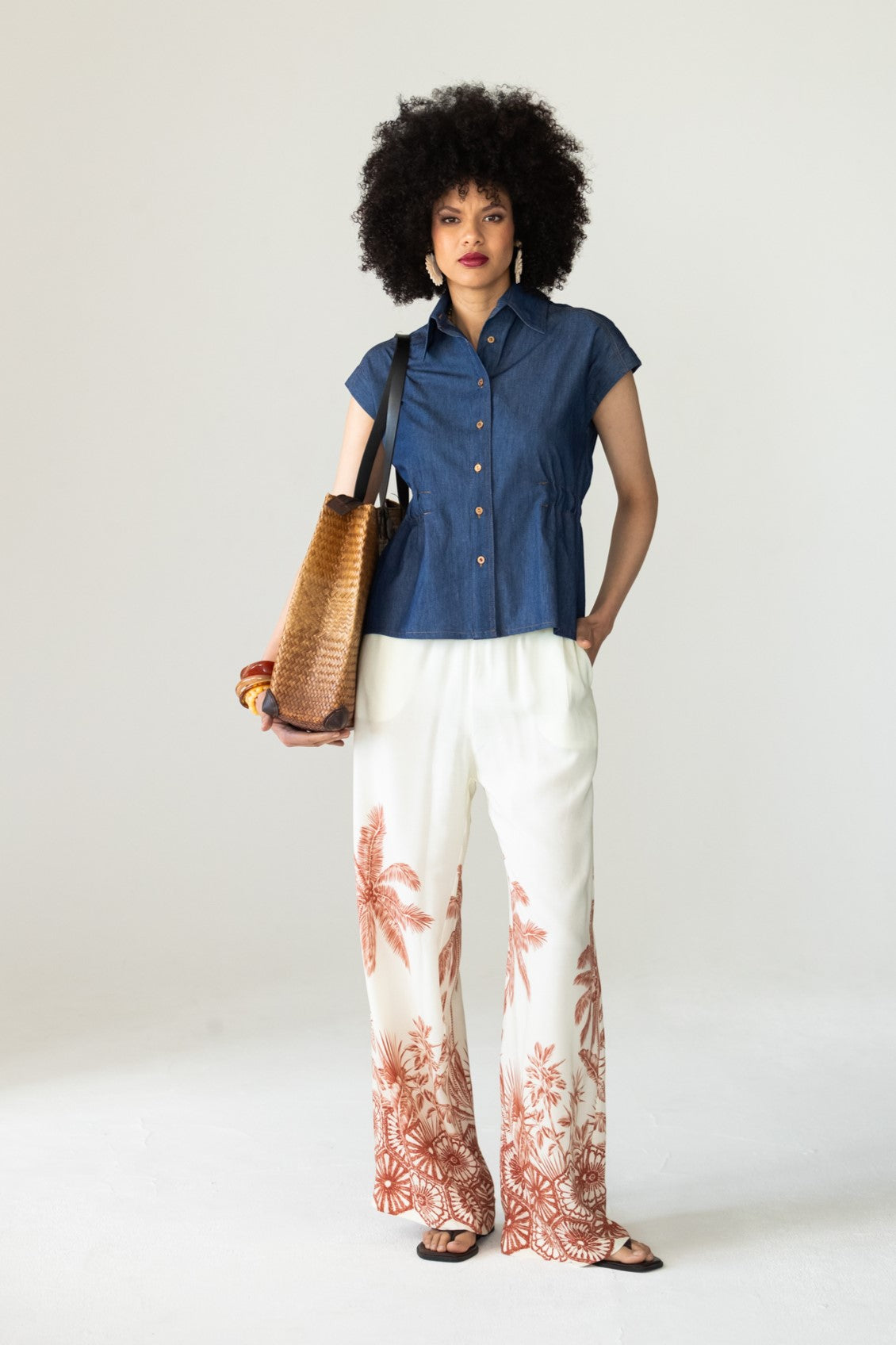 Sydney creme palm border wide leg pants, front view styled with denim shirt