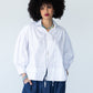 Blake white poplin shirt, front view styled with denim balloon pants